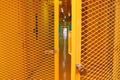 Open yellow grating steel door Royalty Free Stock Photo