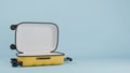 Open yellow travel suitcase lying on the floor on a blue background. 3D rendering.