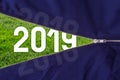 Open zipper on fresh green grass background with 2019 text.