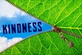 Kindness word under zipper leaf