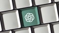 ChatGPT OpenAI logo is featured prominently on a keyboard key, symbolizing innovation in technology Royalty Free Stock Photo