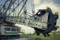 Opencast brown coal mine. Excavator SchRs-315. Extractive industry Royalty Free Stock Photo