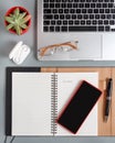 Opened agenda with handwritten MONDAY on a grey desk Royalty Free Stock Photo