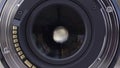 Opened aperture of a professional camera lens, close up. Opened camera lens diaphragm, front view, photography concept.