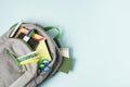 Opened backpack with school supplies . High quality and resolution beautiful photo concept Royalty Free Stock Photo