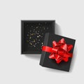 Opened black empty gift box with red ribbon and bow on dark background. Vector illustration Royalty Free Stock Photo