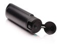 Opened black plastic bottle with male shampoo Royalty Free Stock Photo