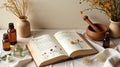 Opened Book with Medicinal Herbs and Essential Oils for Aromatherapy Royalty Free Stock Photo