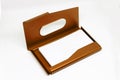 Opened business card holder in golden color on a white background.