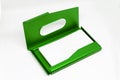 Opened business card holder in green color on a white background.