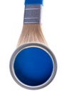 Opened can of blue paint with brush on white background Royalty Free Stock Photo