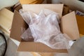 An opened cardboard box with bubble wrap inside Royalty Free Stock Photo