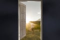 an opened door into the new workld, entrance to another life creative idea Royalty Free Stock Photo