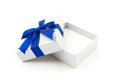 Opened gift with blue bow Royalty Free Stock Photo