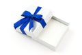 Opened gift with blue bow Royalty Free Stock Photo