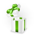 Opened gift box with green ribbon bow Royalty Free Stock Photo