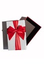 Opened gift box with lid and red ribbon isolated on white Royalty Free Stock Photo