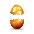 Opened golden easter egg on white background. Colored egg. Royalty Free Stock Photo