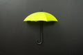 Green umbrella isolated on black background Royalty Free Stock Photo