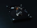 Opened hard drive disk on dark background. Royalty Free Stock Photo