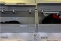 Passenger plane interior details. Luggage shelfs inside the passenger airplane