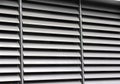 Opened metallic window shutter at the office building