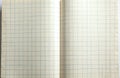Opened notebook graph paper pages. Background of a grid pattern. Suitable for education mathematics science school projects. Royalty Free Stock Photo