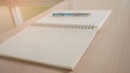 Opened notebook with pen on the desk. Royalty Free Stock Photo