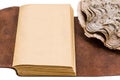 Opened old leather book isolated on white background Royalty Free Stock Photo