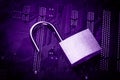 Opened padlock on computer motherboard. Internet data privacy information security concept. Ultraviolet toned image Royalty Free Stock Photo