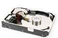 Opened pc hard disc isolated over white background Royalty Free Stock Photo