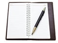 Opened pocket notebook and ballpen Royalty Free Stock Photo