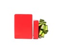 Opened red gift box with green-golden bow. Royalty Free Stock Photo
