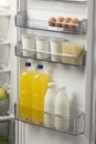 Opened refrigerator full of foodstuff Royalty Free Stock Photo