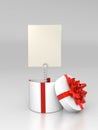 Opened round gift box with blank card Royalty Free Stock Photo