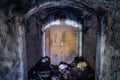 Opened rusty armored hermetic door, entrance to abandoned Soviet warship ammunition depot