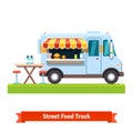 Opened street food truck with free table