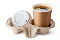 Opened take-out coffee in holder. Lid is near. Royalty Free Stock Photo