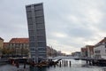 Opened Trangravsbroen (Butterfly 3-Way Trangrav Bridge) across Christianshavn Canal, Copenhagen, Denmark Royalty Free Stock Photo