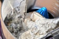 Opened vacuum brokencleaner container and filter with heap of dirty dust Royalty Free Stock Photo