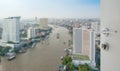 Opened white door to bangkok city skyline along chaophraya river