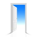 Opened white door with view on clear sky