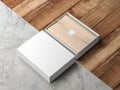 Opened White Gift Box Mockup with kraft wrapping paper and round label on modern floor