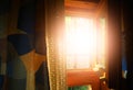 Opened window at sunset countryside cabin Royalty Free Stock Photo
