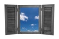 Opened Wooden Window to View of Blue Sky Isolated on White Background Royalty Free Stock Photo