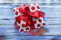 Opened wrapped present box on vintage wooden board Royalty Free Stock Photo