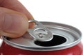 Opening a beverage can with an operculum close-up on a white background Royalty Free Stock Photo