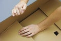 Opening cardboard box Royalty Free Stock Photo
