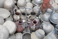 opening of a ceramic kiln, Unique handmade pots and dishes of clay getting black after firing and oxygen reducing