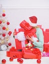 Opening christmas gift. Girl near christmas tree happy celebrate holiday. Santa bring her gift that she always wanted Royalty Free Stock Photo